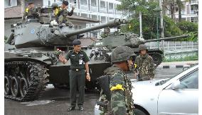 Military seizes power in Thailand in coup, ousts Thaksin