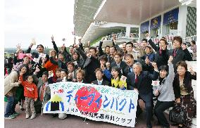 Japanese visitors at Longchamp racecourse
