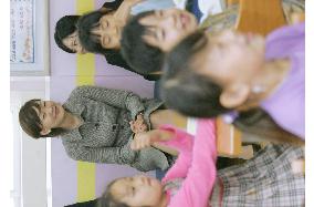 Japan's first lady visits Seoul school, introduces herself in Korean
