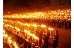 N. Korean youths conduct torch march in Pyongyang