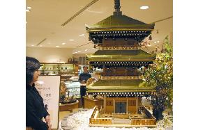 Noodle-made three-story pagoda is on display