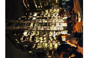 Peace symbols lit up at United Nations University in Tokyo