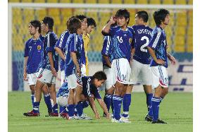 Japan crash out of soccer tourney