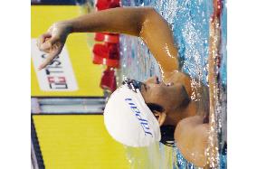 Koga grabs gold in 50-meter backstroke