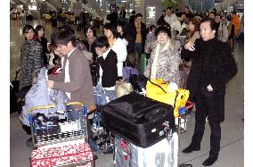 New Year holiday-makers pack Kansai airport