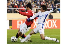 Lucky Urawa give Buchwald perfect send-off with cup win