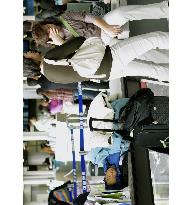 Stormy weather grounds flights, snow delays bullet trains