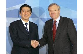 Abe tells NATO Japan won't shy from sending troops for int'l peace