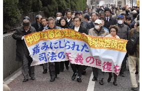 Former war-displaced back from China appeal Tokyo court ruling