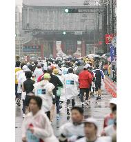 First Tokyo Marathon held in rain