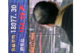 Nikkei recovers 18,000 mark for 1st time in nearly 7 yrs