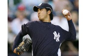 Igawa pitches 5 shutout innings, gets 1st spring win