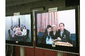 North, South Koreans arrange reunion on television screens