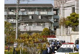 Man locks himself in building in Tokyo suburb, fires outside