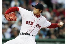 Okajima retires 2 batters in Boston's 7-5 win over Yankees