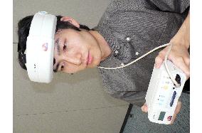 Hitachi develops portable apparatus to measure brain activity