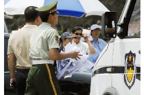 Police keep watch at Tiananmen Square on 18th anniversary