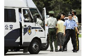 Police keep watch at Tiananmen Square on 18th anniversary