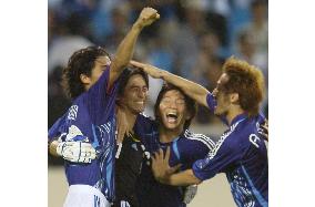 Japan shoot down Aussies, Kawaguchi celebrates with teammates
