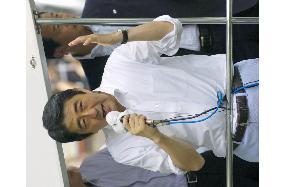 Abe, Ozawa make last pitch for Sunday's national election