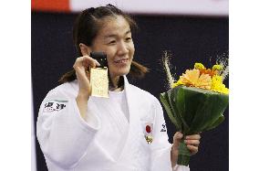 Tani wins gold in 48 kg weight class