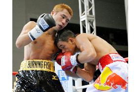 Sakata gets draw to remain WBA flyweight champion