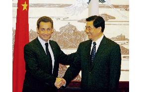 French president urges China to revalue currency