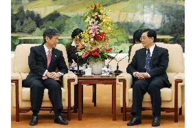 China's Hu eyes Japan visit at an early date next year