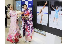 Asada sisters meet press for photo exhibition