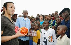 Ex-Japan soccer star Nakata visits refugee camp in Africa