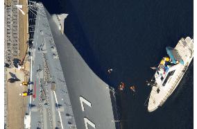 Coast Guard divers examine destroyer involved in collision