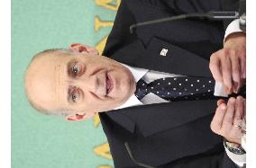 Olmert meets press in Tokyo