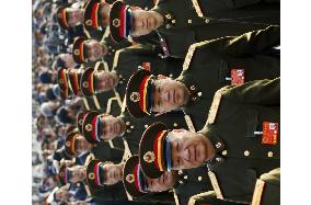 China parliament in session, military delegates in attendance