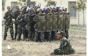 Riot police seen training in ethnic Tibetan area of China
