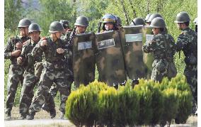 Riot police seen training in ethnic Tibetan area of China