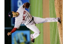 Red Sox Matsuzaka rolls over Athletics for 1st season win