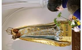 Restored Black Madonna statue returns to Yamagata church