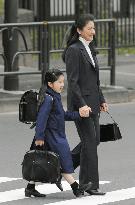 Crown Princess Masako walks Princess Aiko to school