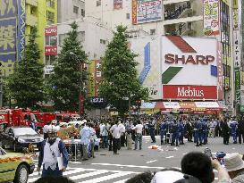 Man hits people with truck, stabs many in Tokyo's Akihabara