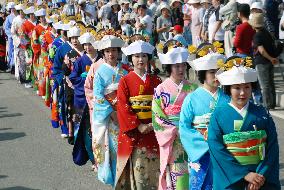 Women in wedding attire parade in Aizu-Tashima 'Gion' festival