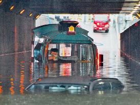 Bus submerged in flood in Kyoto