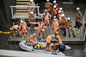 5 workers washed away in Tokyo underground sewage system