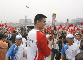 Olympic torch relay under way in Beijing amid tight security