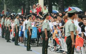 Olympic torch relay under way in Beijing amid tight security