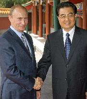 Olympics diplomacy: Hu Jintao meets Russia Prime Minister Putin