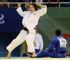 Japan's Tanimoto defends judo title in Beijing