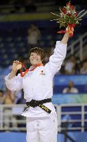 Japan's Tanimoto strikes gold to defend judo crown in Beijing
