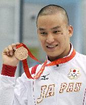 Matsuda wins bronze in men's 200-meter butterfly at Beijing