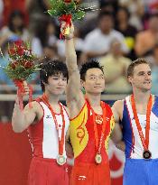 China's Yang wins men's individual all-around gymnastics