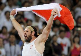 Olympics: Tomasz Majewski of Poland wins men's shot put